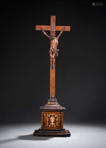 AN ELABORATE BAROQUE CARVED FRUITWOOD WALNUT AND IVORY CRUCI...