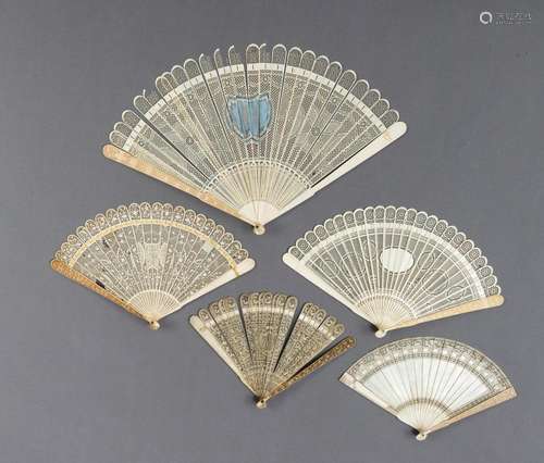 FIVE OPENWORK ARMORIAL IVORY FANS