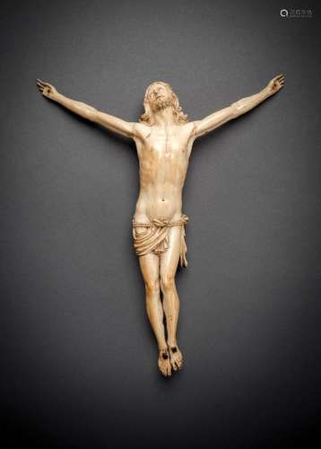 A CARVED IVORY BODY OF CHRIST