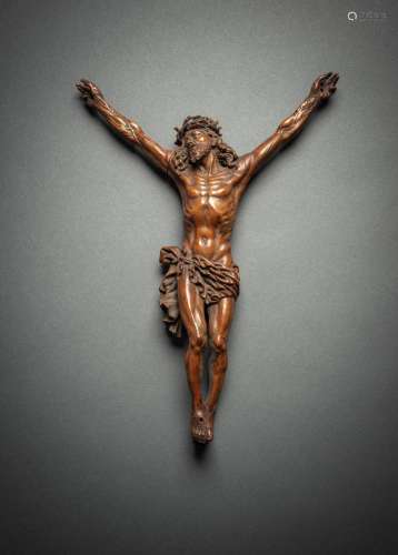 A CARVED WOOD BODY OF CHRIST