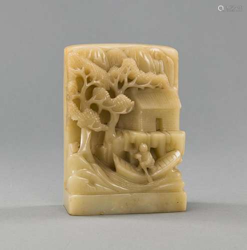 A JADE CARVING DEPICTING A FISHERMAN WITH HOUSE AND PINE TRE...