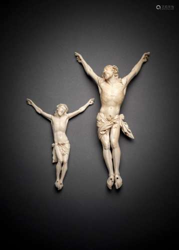 TWO CARVED IVORY BODIES OF CHRIST