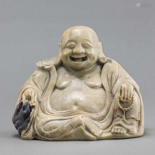 A SOAPSTONE CARVING OF LAUGHING BUDAI