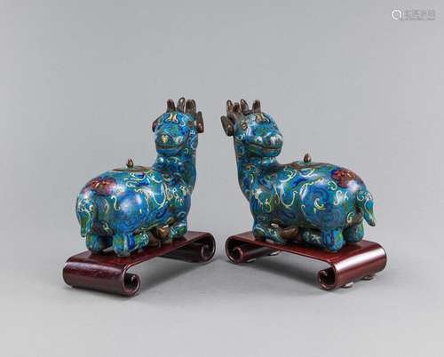 A PAIR OF CLOISONNÉ LIDDED VESSELS IN THE SHAPE OF LYING DEE...