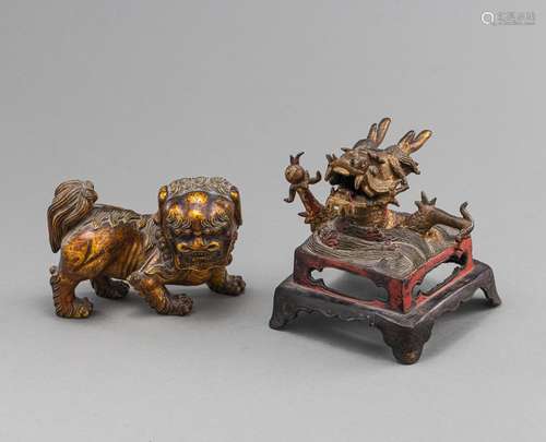 A BRONZE DRAGON STAND AND A GILT-LACQUERED WOOD FIGURE OF A ...