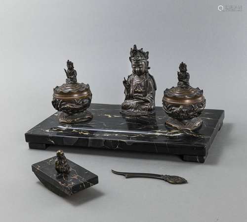 A BRONZE AND STONE GUANYIN DESK SET