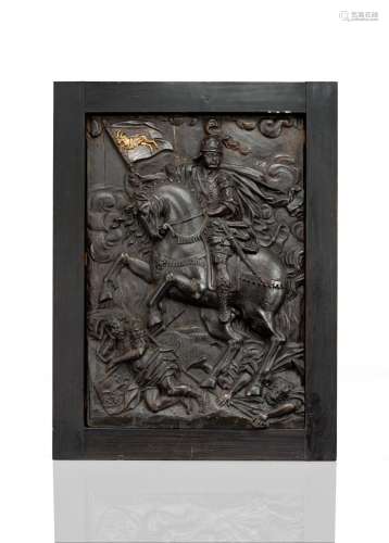 A RELIEF CARVED PLAQUE WITH BATTLE SCENE