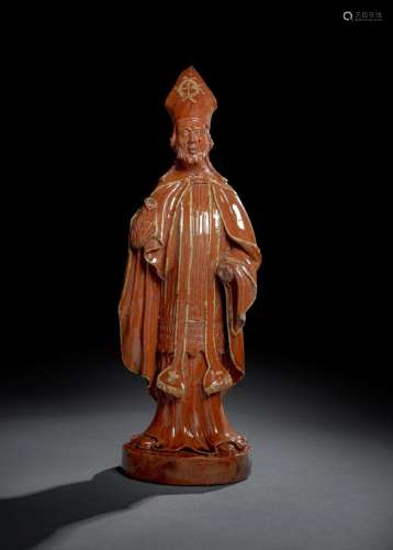 A TERRACOTTA FIGURE OF A HOLY BISHOP