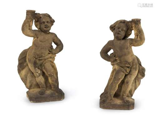A PAIR OF SANDSTONE CARVED PUTTI