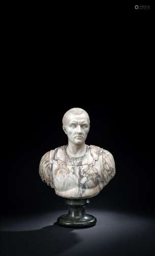 A MARBLE AND SERPENTINE BUST OF JULIUS CAESAR