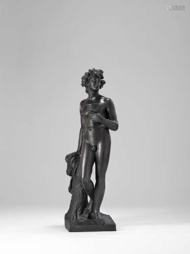 A BRONZE FIGURE OF BACCHUS WITH WINE CUP