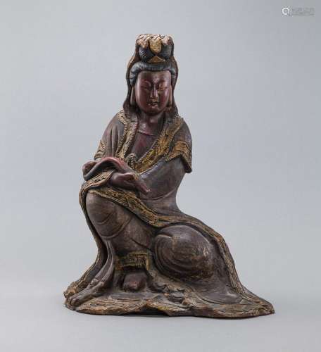A LACQUER- AND GOLD-DECORATED WOOD FIGURE OF GUANYIN