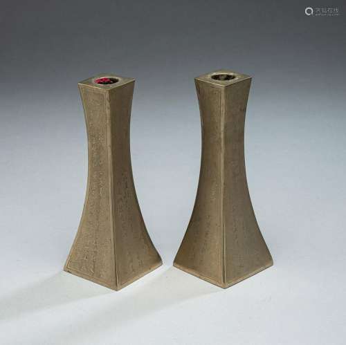 A PAIR OF PAKTON CANDLESTICKS DECORATED WITH CALLIGRAPHY ON ...