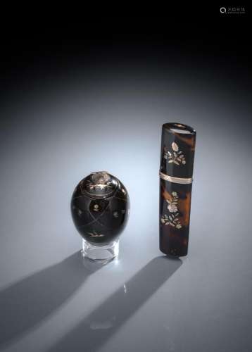 AN EGG SHAPED TORTOISE SHELL SNUFF BOX AND A GOLD MOUNTED NE...