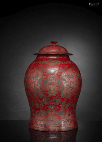 A RE-LACQUERED VASE WITH INCISED LOTUS AND SCROLL WORK