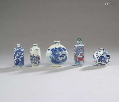 A GROUP OF FIVE BLUE AND WHITE PORCELAIN SNUFFBOTTLES, TWO A...