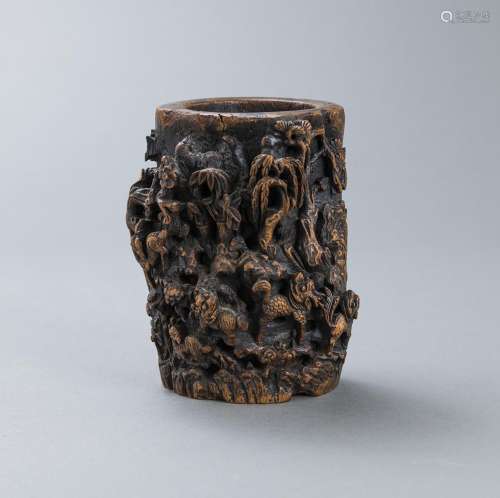 A RELIEF CARVED AND INSCRIBED ANIMALS AND LOTUS BAMBOO BRUSH...
