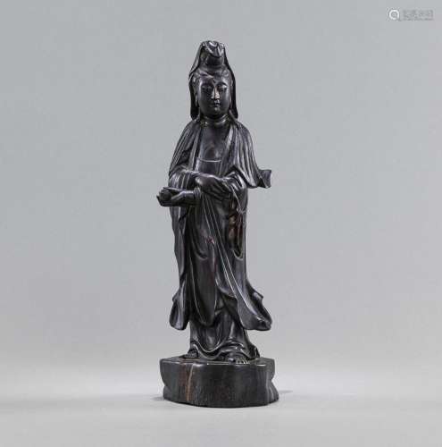 A WOOD CARVING OF STANDING GUANYIN