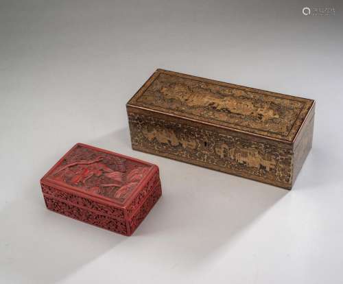 A LACQUERED BOX AND COVER WITH GOLD PAINTING OF A FIGURAL SC...