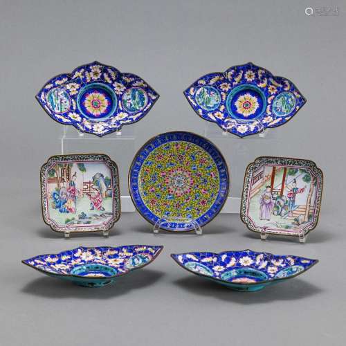 SEVEN DISHES AND SAUCERS WITH FIGURAL AND FLORAL DECORATION ...