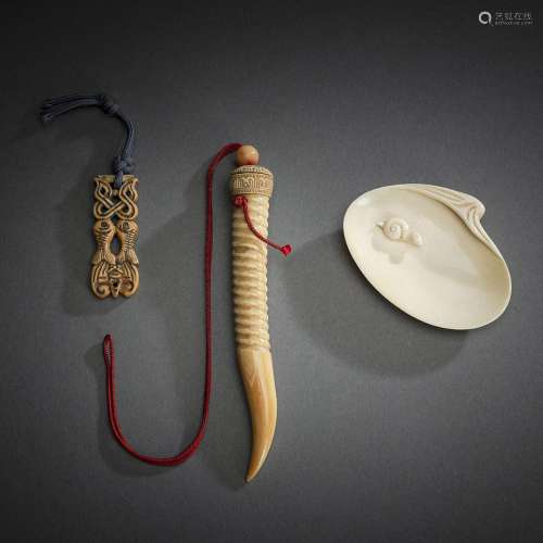 THREE IVORY CARVINGS, E.G. A SMALL DISH WITH A SNAIL IN RELI...