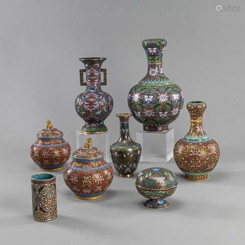 A GROUP OF EIGHT FLORAL CLOISONNÉ AND CHAMPLEVE ENAMEL OBJEC...