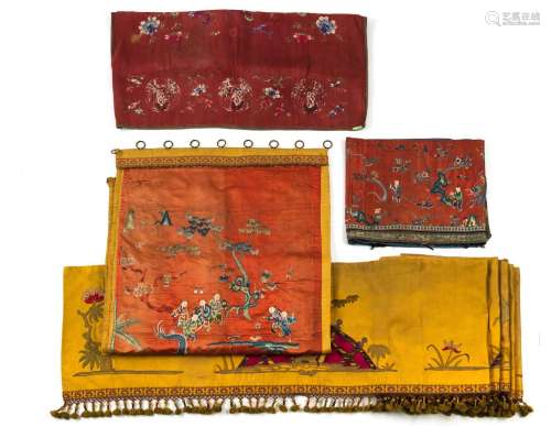 A GROUP OF SILK EMBROIDERY WITH FIGURE DECORATION, ON A RED ...