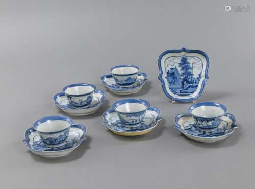 A GROUP OF SIC BLUE AND WHITE BOWLS AND FIVE CUPS