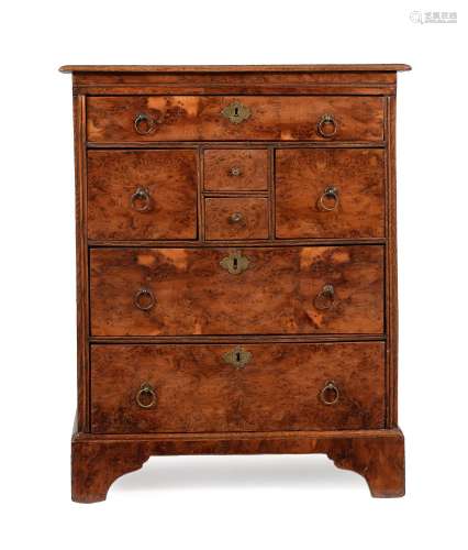 AN UNUSUAL WILLIAM III YEW WOOD AND OAK CHEST OF DRAWERS, CI...
