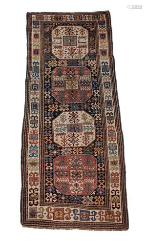 AN AKSTAFA LONG RUG, approximately 256 x 98cm