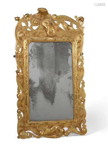 A CARVED GILTWOOD WALL MIRROR POSSIBLY IRISH, SECOND QUARTER...