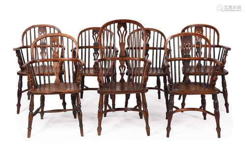 A HARLEQUIN SET OF SEVEN ASH AND ELM WINDSOR ARMCHAIRS, THAM...