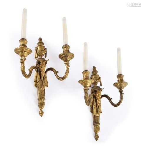 A PAIR OF FRENCH GILT BRONZE TWIN LIGHT WALL APPLIQUES, AFTE...