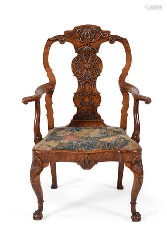 A GEORGE II WALNUT AND BEECH OPEN ARMCHAIR, CIRCA 1735