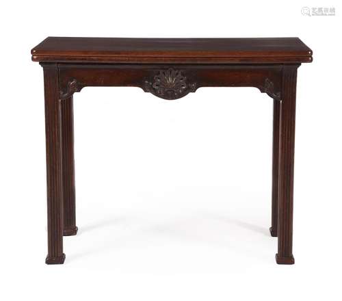 A GEORGE III MAHOGANY TEA TABLE, IN THE MANNER OF CHIPPENDAL...