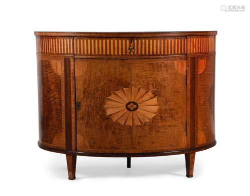 Y A GEORGE III HAREWOOD, SATINWOOD AND MARQUETRY BOWFRONT CO...