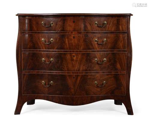 A GEORGE III MAHOGANY SERPENTINE COMMODE IN THE MANNER OF HE...