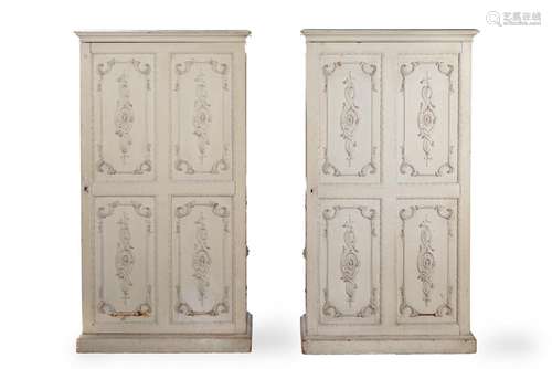 A PAIR OF OFF-WHITE PAINTED CUPBOARDS, IN CHIPPENDALE STYLE,...