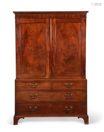 A GEORGE III MAHOGANY CLOTHES PRESS BY GILLOWS, CIRCA 1790