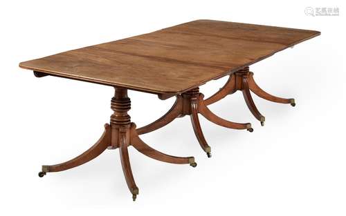 A MAHOGANY TRIPLE PILLAR DINING TABLE, EARLY 19TH CENTURY AN...