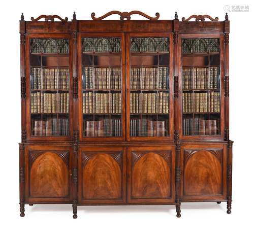 Y A GEORGE IV MAHOGANY AND SIMULATED ROSEWOOD BREAKFRONT LIB...