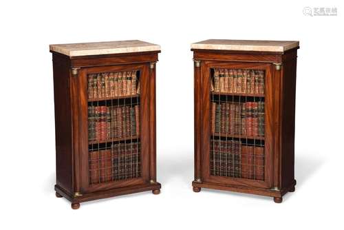 Y A PAIR OF REGENCY ROSEWOOD AND BRASS MOUNTED PIER CABINETS...