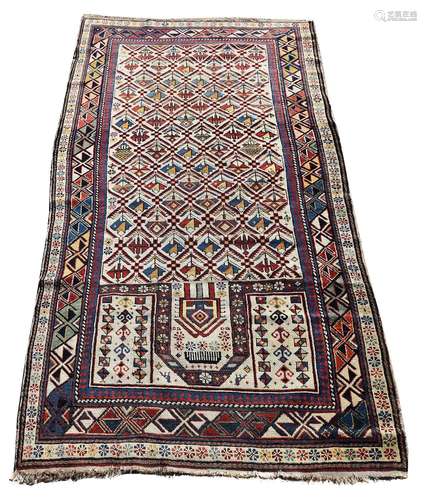 A CAUCASIAN PRAYER RUG, PROBABLY DAGESTAN, approximately 192...