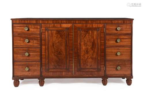 A REGENCY MAHOGANY LOW PRESS OR COMPACTUM, IN THE MANNER OF ...