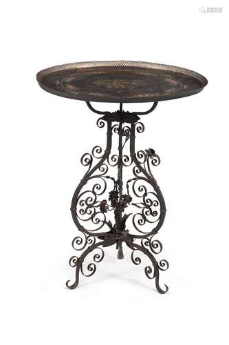 A TOLEWARE PAINTED METAL TRAY ON WROUGHT IRON STAND THE TRAY...