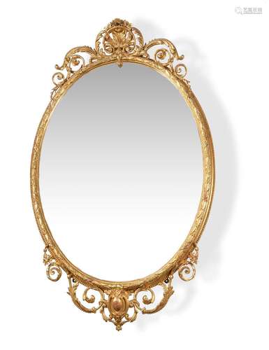 A VICTORIAN GILTWOOD AND COMPOSITION OVAL WALL MIRROR THIRD ...