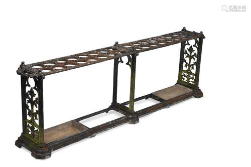 A LATE VICTORIAN DOUBLE LENGTH CAST IRON STICK STAND, IN THE...