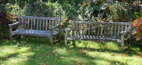 TWO WEATHERED HARDWOOD BENCHES IN THE MANNER OF R. A. LISTER