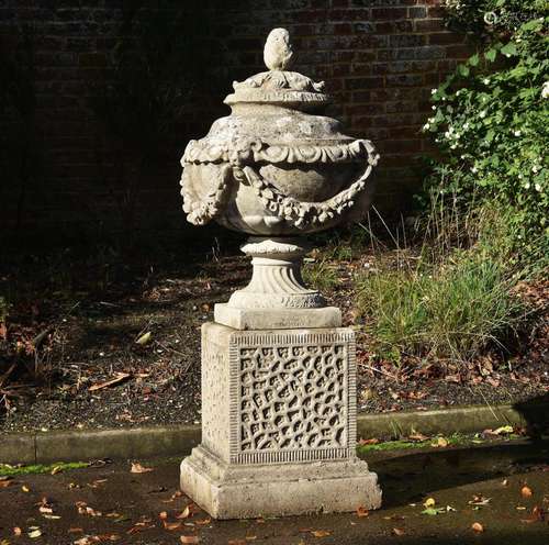 A COMPOSTION STONE CENTREPIECE, ATTRIBUTED TO AUSTIN & S...