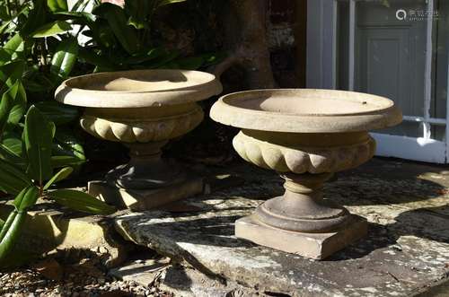 A PAIR OF TERRACOTTA VASES IN THE MANNER OF PULHAM